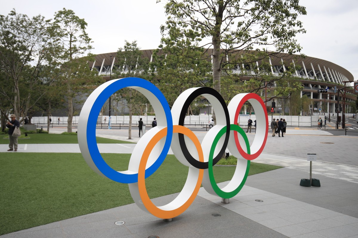 A figure of the Olympic rings as seen in front of Tokyo’s Olympic stadium. A new survey shows that more than 80 per cent of Japanese people are in favour of the Games being cancelled because of the coronavirus pandemic. Photo: DPA
