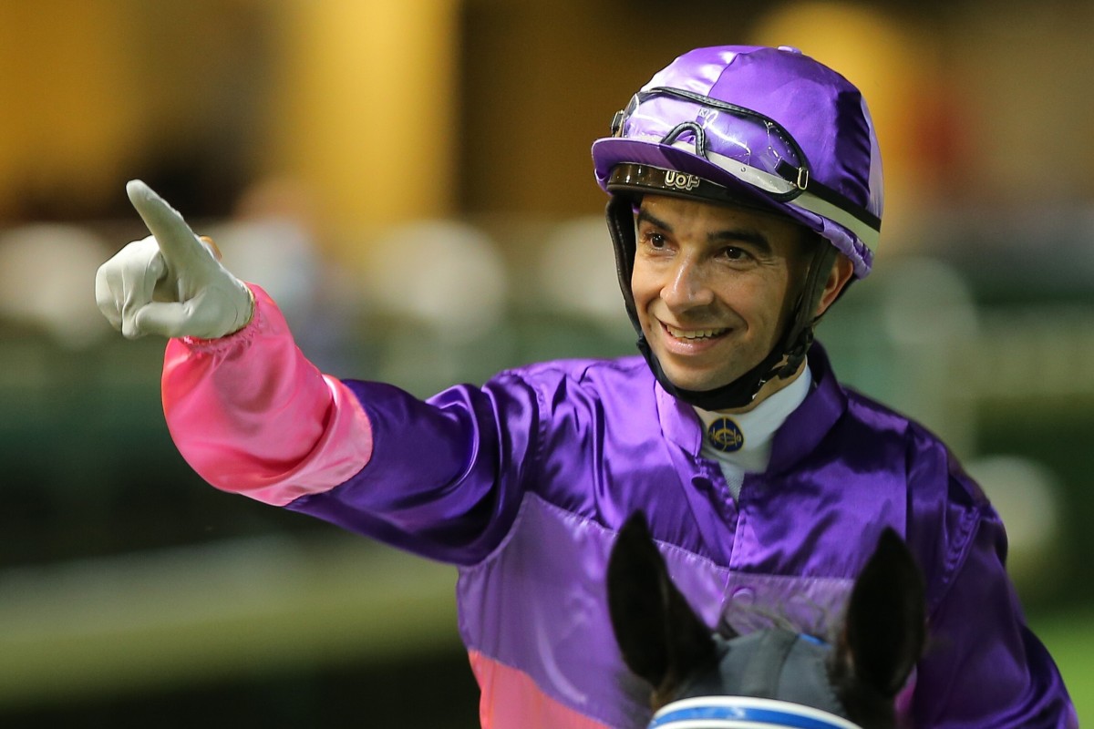 Joao Moreira celebrates one of his five winners at Happy Valley on Wednesday night. Photo: Kenneth Chan
