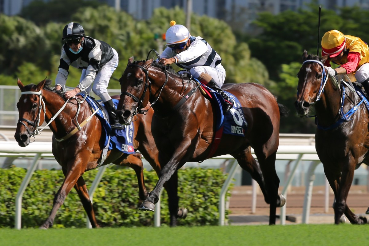 Zac Purton (left) looks on as Panfield runs over the top of Exultant in Sunday’s Champions & Chater Cup. Photos: Kenneth Chan