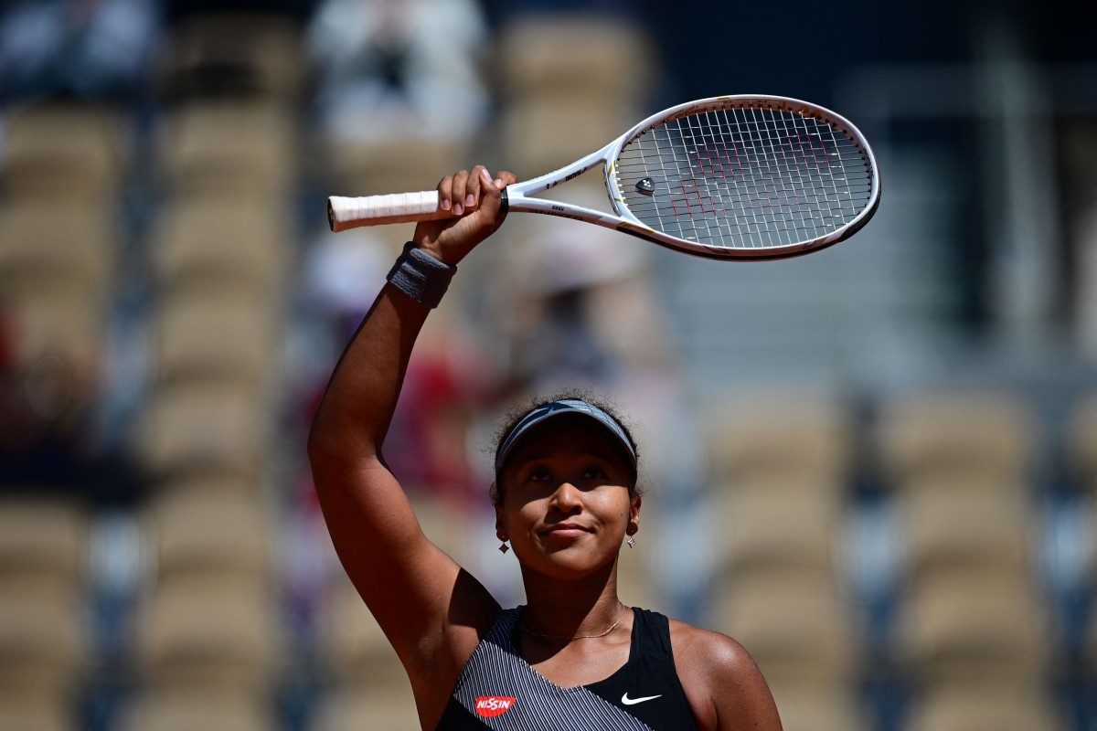 Naomi Osaka celebrates after winning against Romania's Patricia Maria Tig during their women's singles first round tennis match on Day 1 of The Roland Garros 2021 French Open tennis tournament in Paris. She announced she is withdrawing from the competition following the fall-out from her decision to boycott all media activity. Photo: AFP