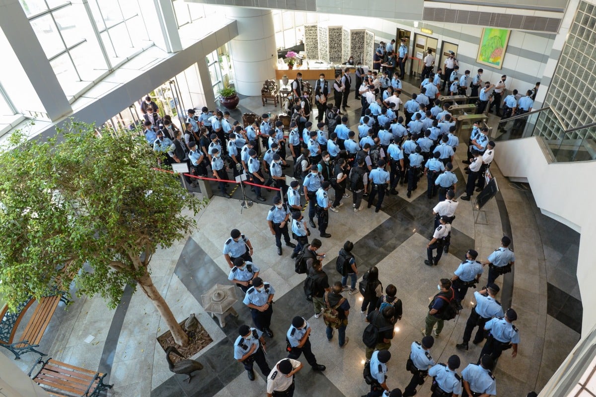 Police search the headquarters of 'Apple Daily' in Tsueng Kwan O. Photo: Handout