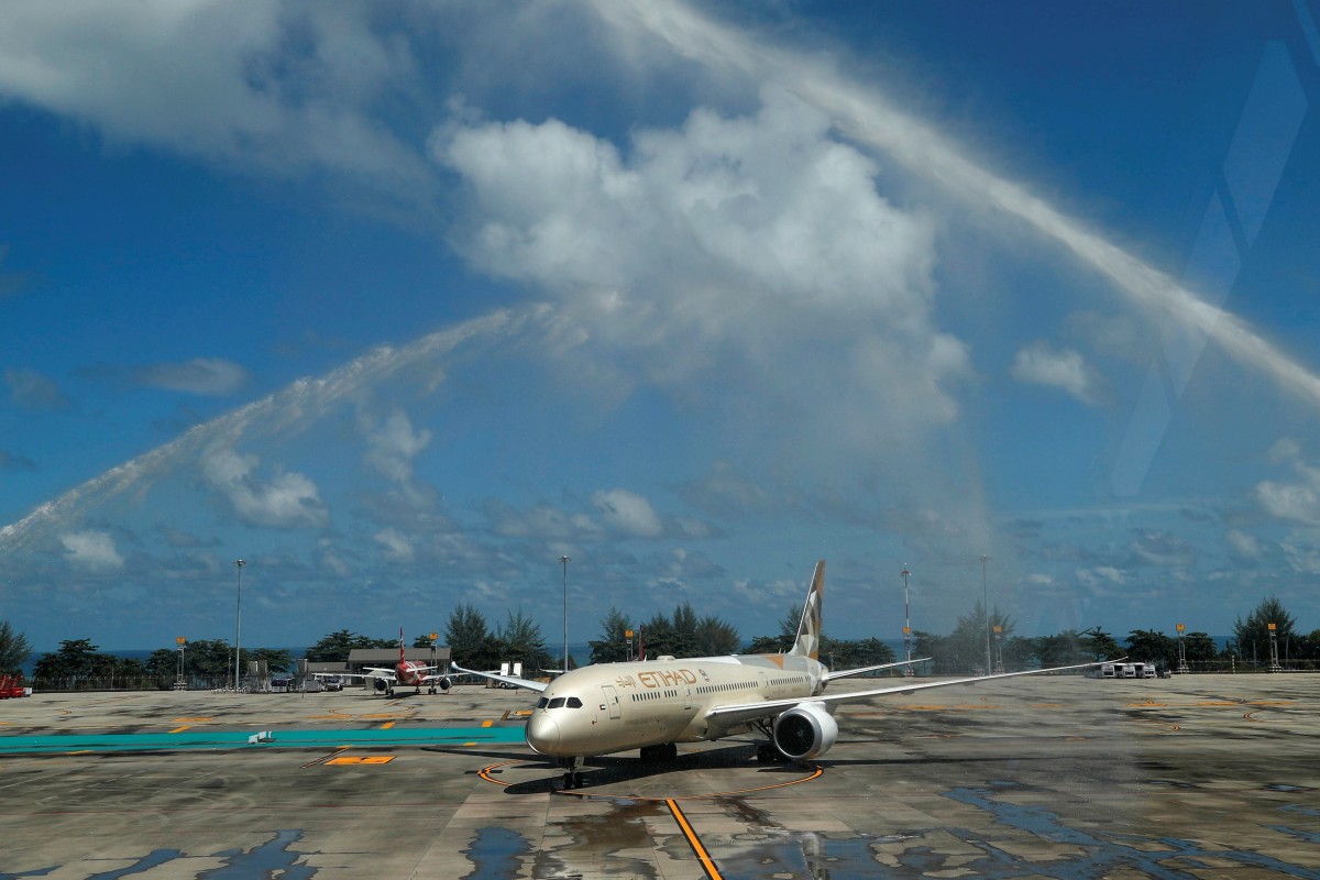 A plane carrying the first foreign tourists arrives at the airport as Phuket reopens to overseas tourists, allowing foreigners fully vaccinated against the coronavirus disease to visit the resort island without quarantine. Photo: Reuters