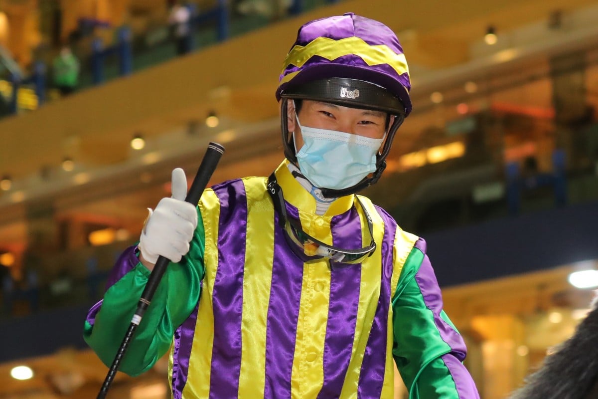Jerry Chau gives the thumbs up after winning aboard Rainbow Light at Happy Valley on Wednesday night. Photos: Kenneth Chan