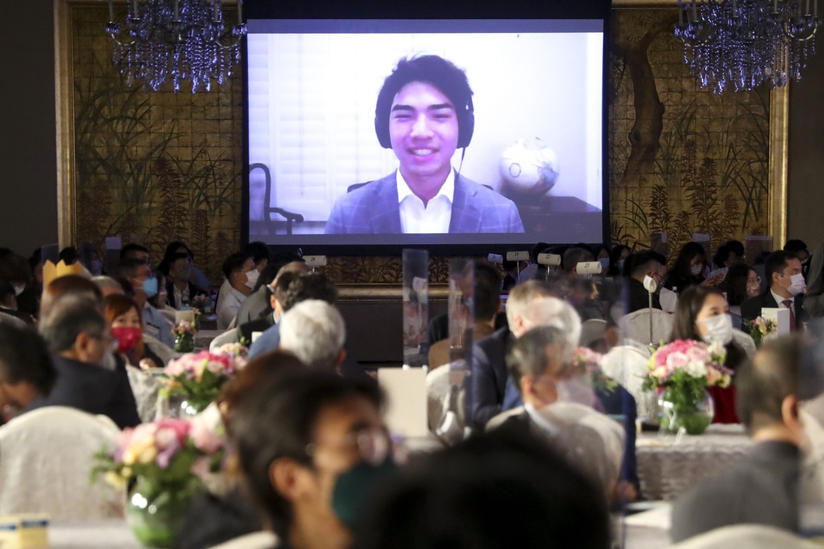 Dylan Fischer speaks at the awards ceremony using videoconferencing. Photo: SCMP / Edmond So