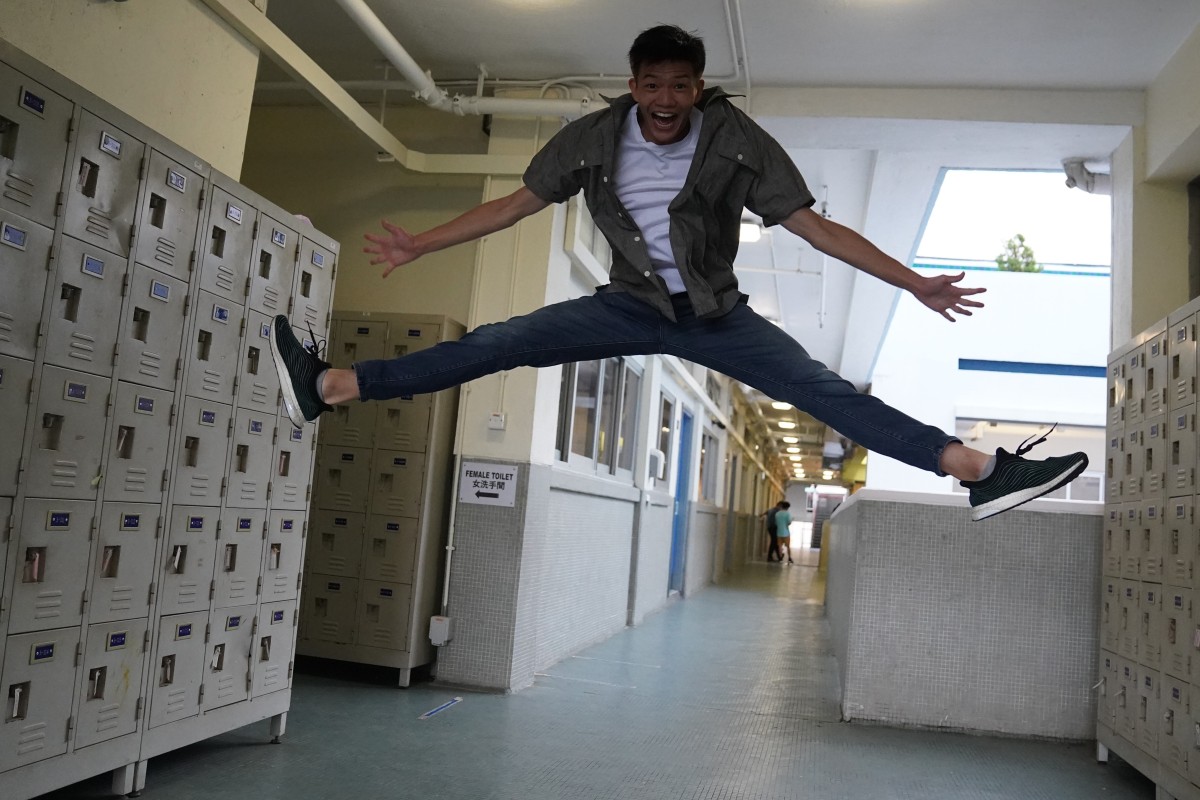 DSE top scorer Ian Chiu Yi-nap poses for pictures at Po Leung-kuk Tang Yuk Tien College in Tuen Mun. Photo: SCMP/ Sam Tsang