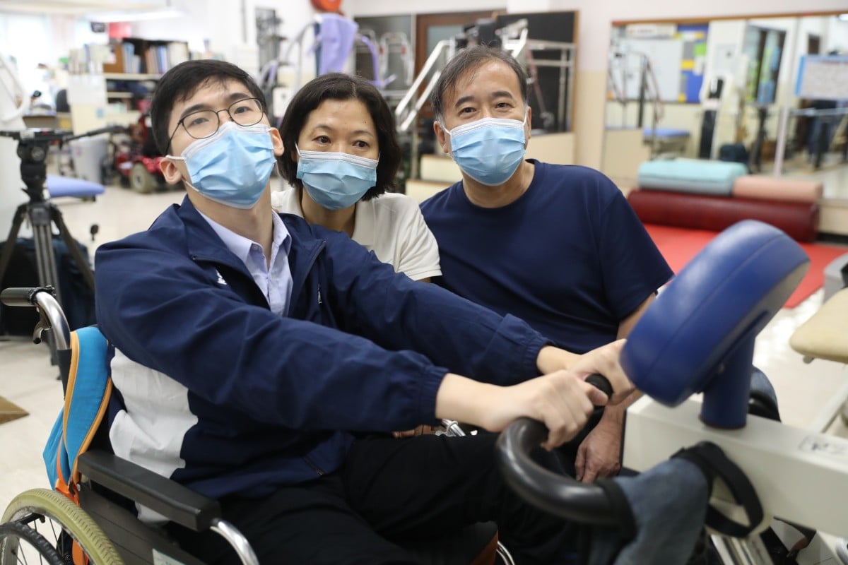 When Ching Chun-ho (from left) received his DSE results on Wednesday, his mother, Yeung Kwai-heung, and father, Michael Ching, were proud of his accomplishments. Photo: SCMP / Edmond So