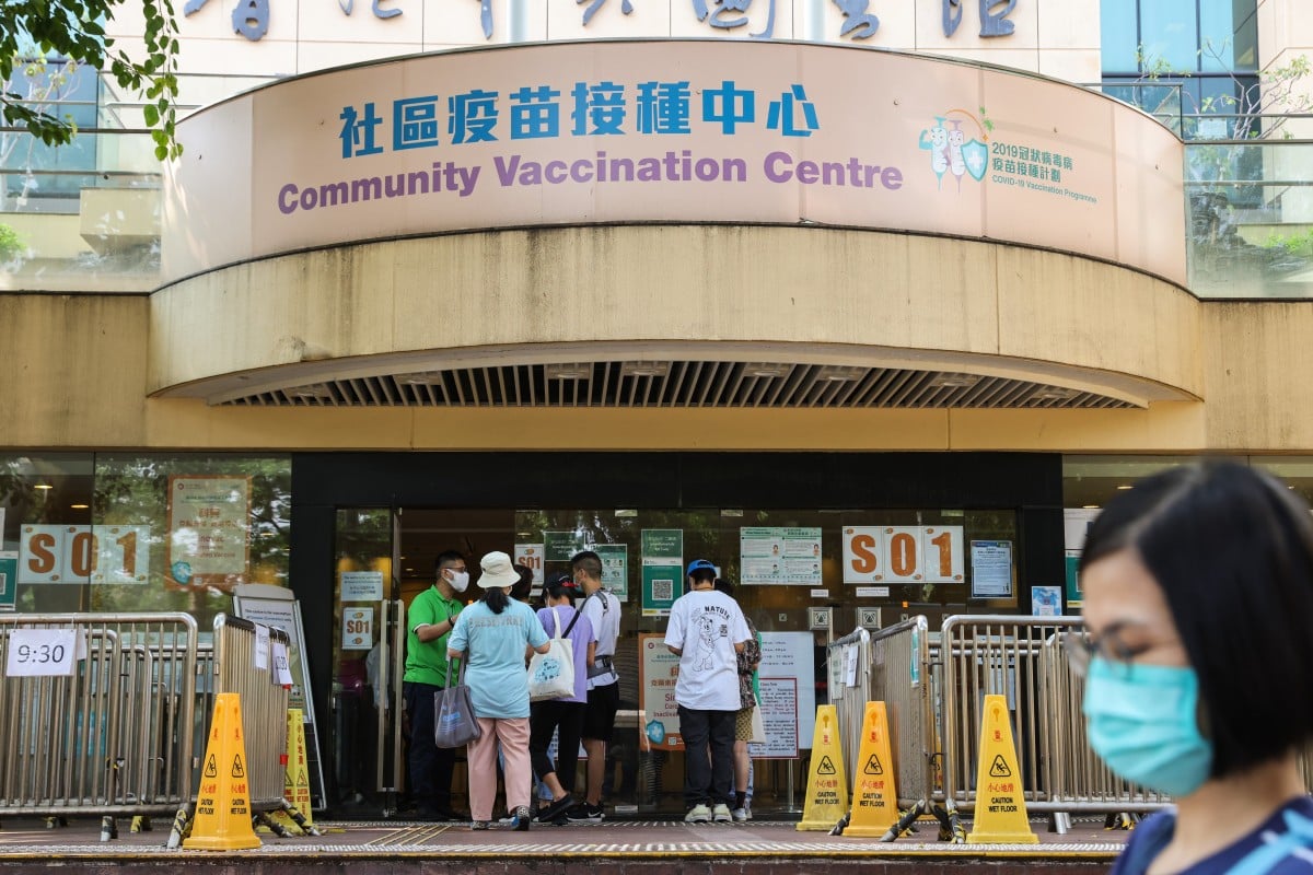 People queue for their Sinovac Covid-19 vaccination at Hong Kong Central Library in Causeway Bay. Photo: SCMP / Nora Tam