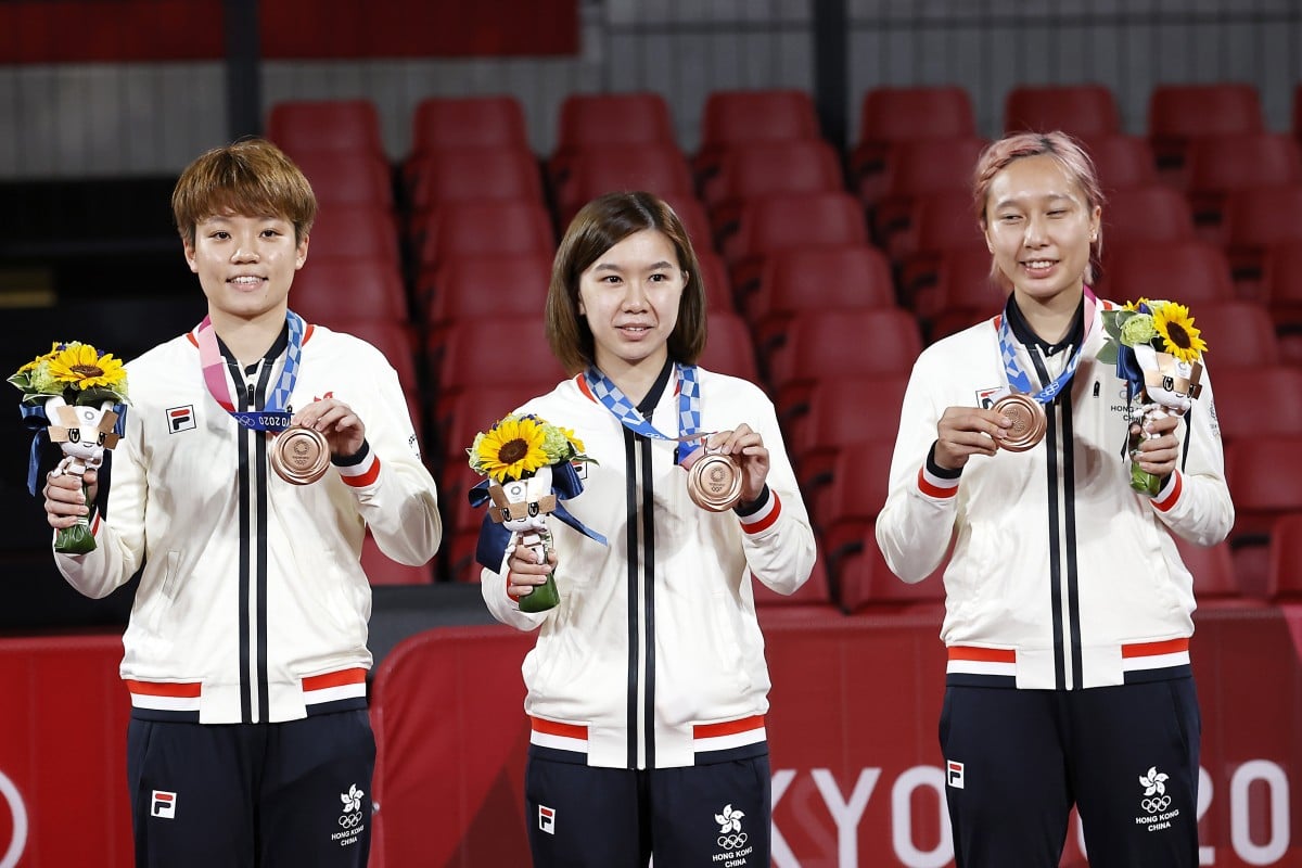 Bronze medallists Doo Hoi-kem (from left), Lee Ho-ching and Minnie Soo brought home Hong Kong’s fourth medal of the Tokyo Olympics. Photo: EPA-EFE