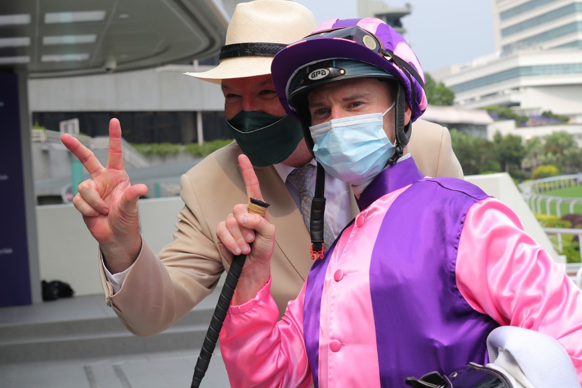 Zac Purton and David Hayes celebrate the jockey’s 1,300th Hong Kong winner. Photos: Kenneth Chan