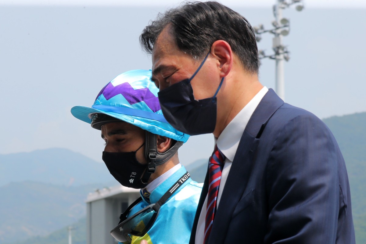 Trainer Michael Chang with jockey Joao Moreira after Steel Win’s victory at Sha Tin on Sunday. Photos: Kenneth Chan