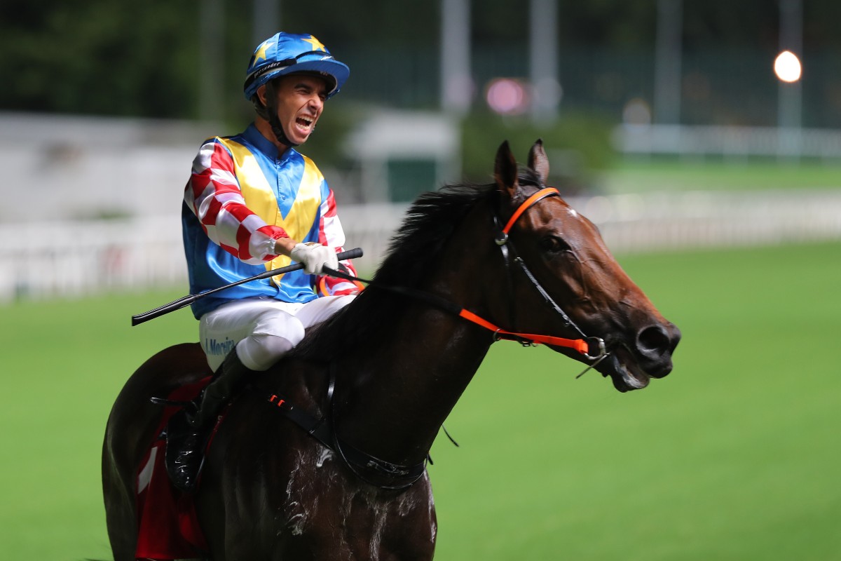 Joao Moreira celebrates his treble at Happy Valley on Wednesday night. Photos: Kenneth Chan