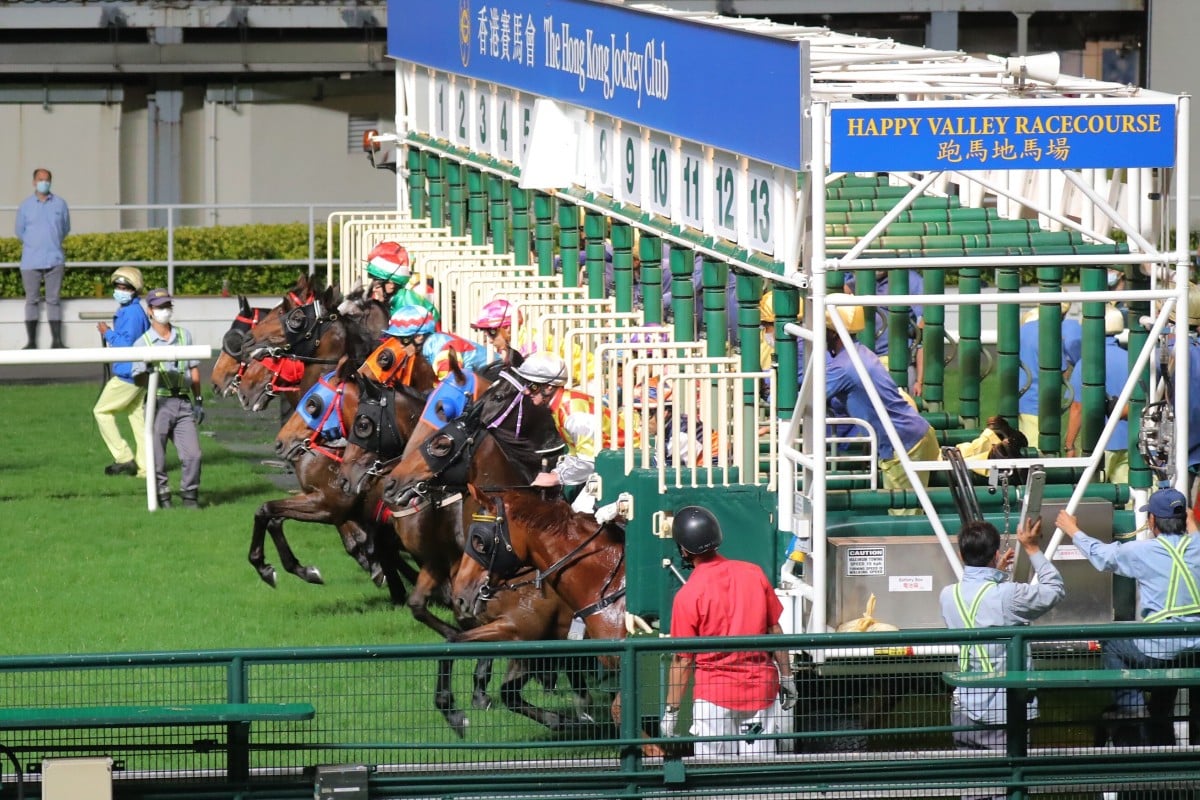 Horses jumps out of the gates at Happy Valley. Photos: Kenneth Chan