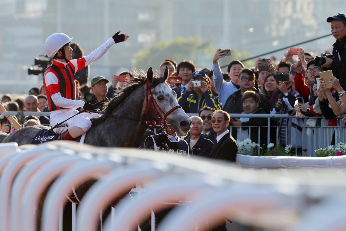 Japanese jockey Masami Matsuoka celebrates winning the 2019 Hong Kong Cup aboard Win Bright. Photos: Kenneth Chan