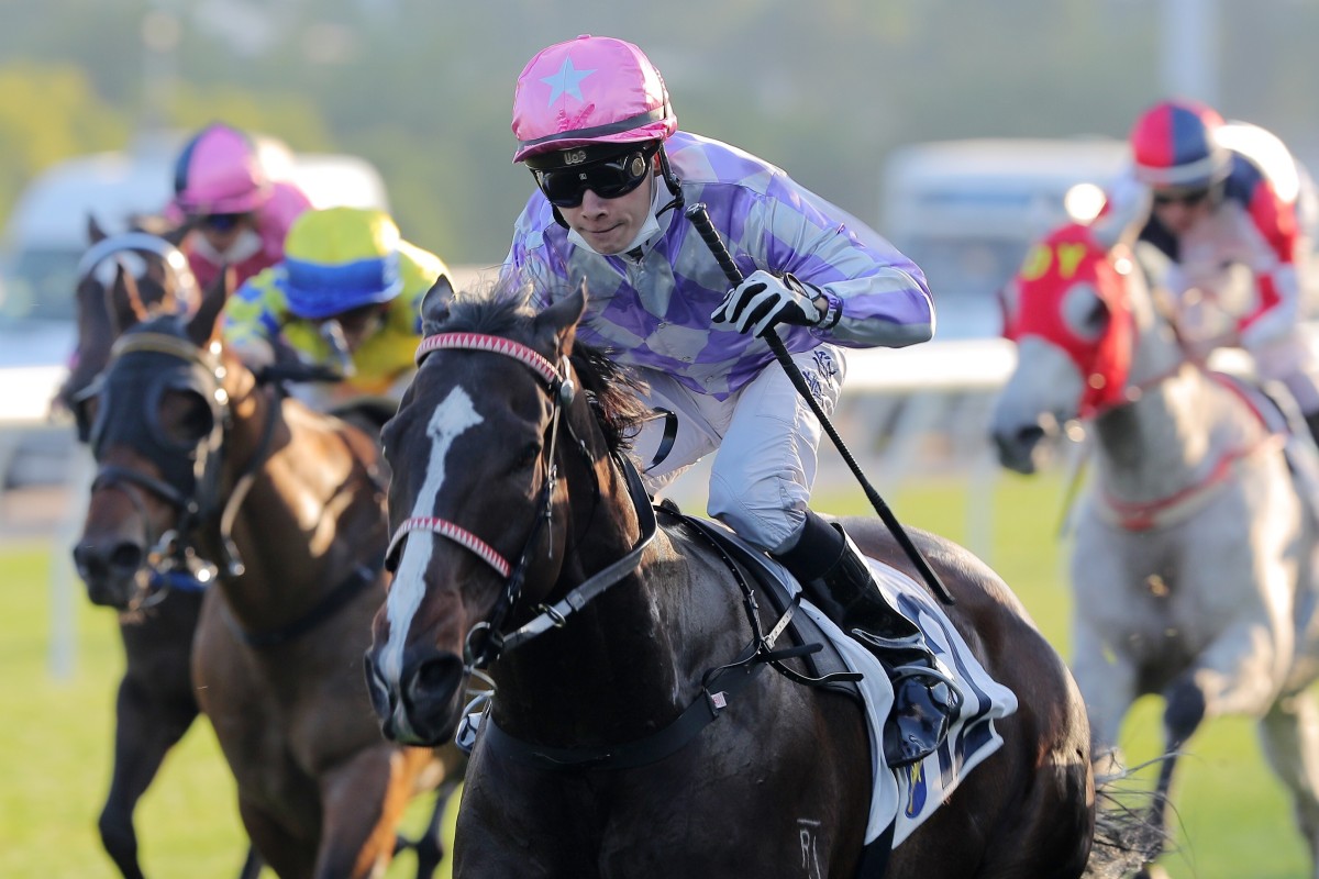 Victor Wong salutes aboard Alcari at Sha Tin on Sunday. Photos: Kenneth Chan