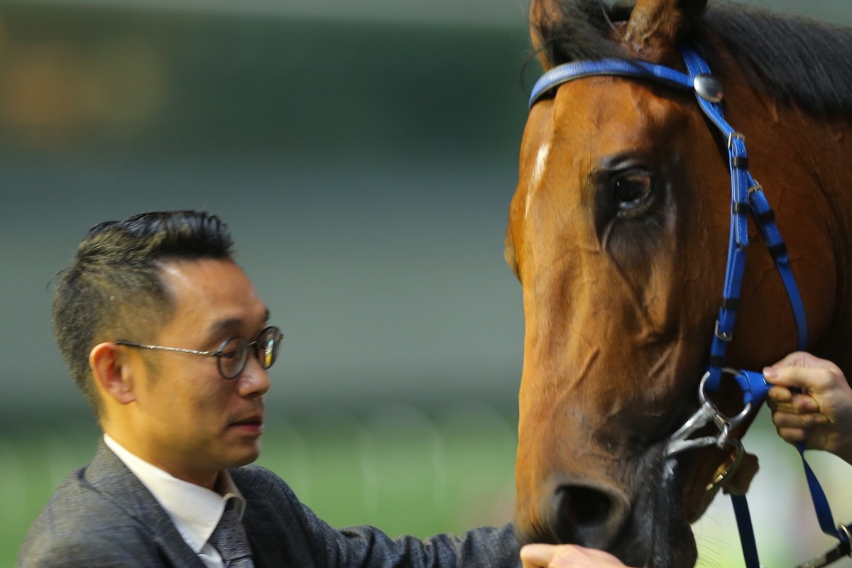 Trainer Jimmy Ting with Amazing Star after a victory. Photo: Kenneth Chan