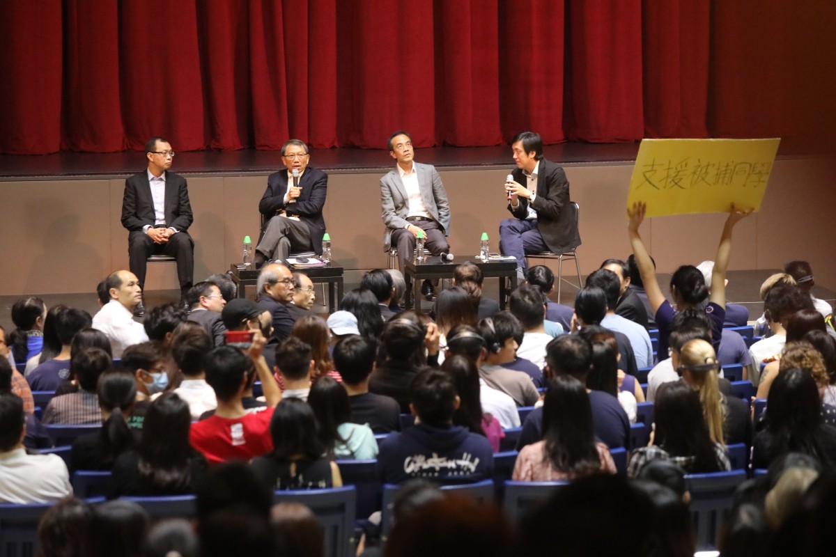Vice-Chancellor Rocky Tuan Sung-chi (second left) of Chinese University on Thursday meets students and alumni for a dialogue session in Sha Tin.