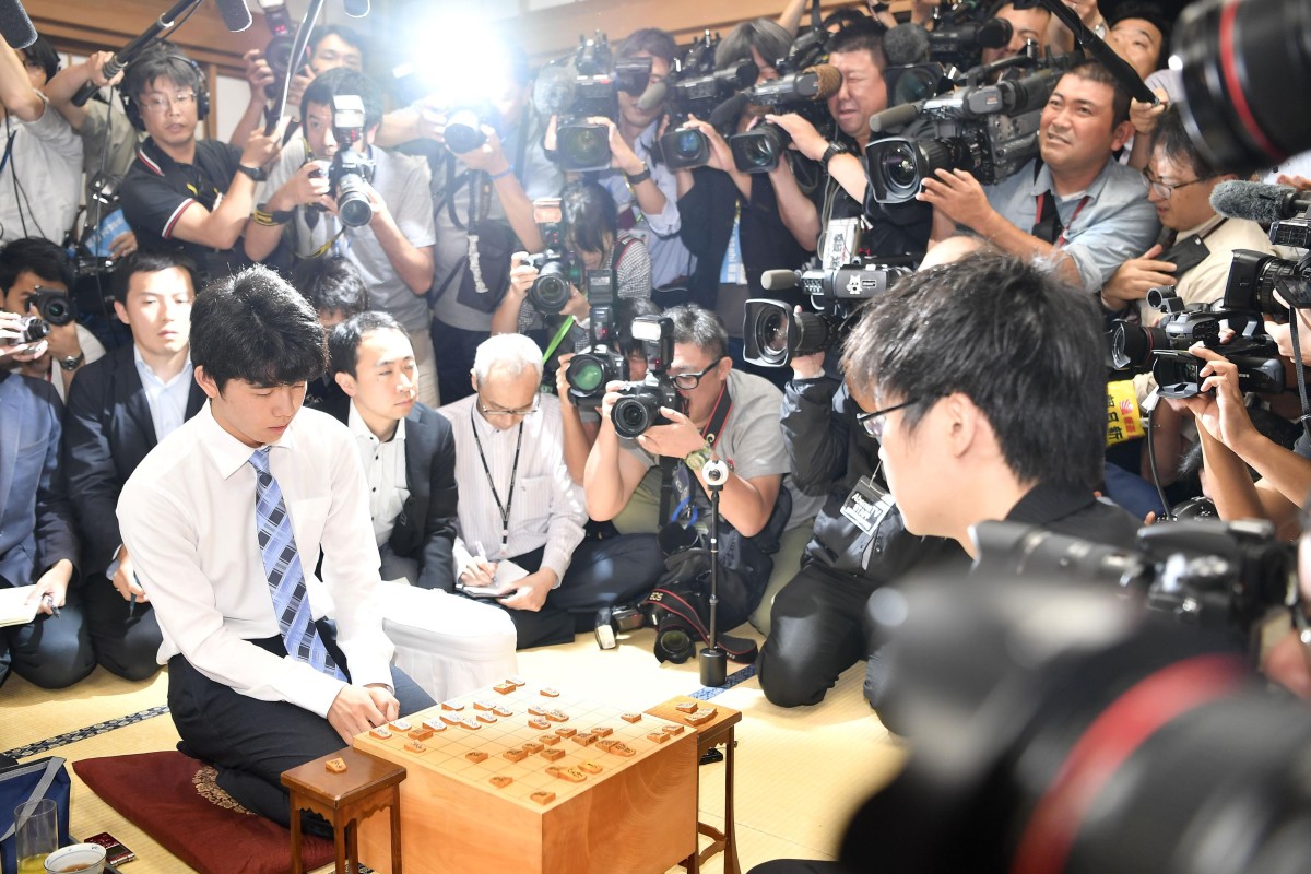 Local high school students perform Ningen Shogi, human Japanese chess on  top of Mt. Maizuru, in Tendo, Yamagata Prefecture on April 22, 2017. Tendo  is known for production of shogi koma,'' pieces