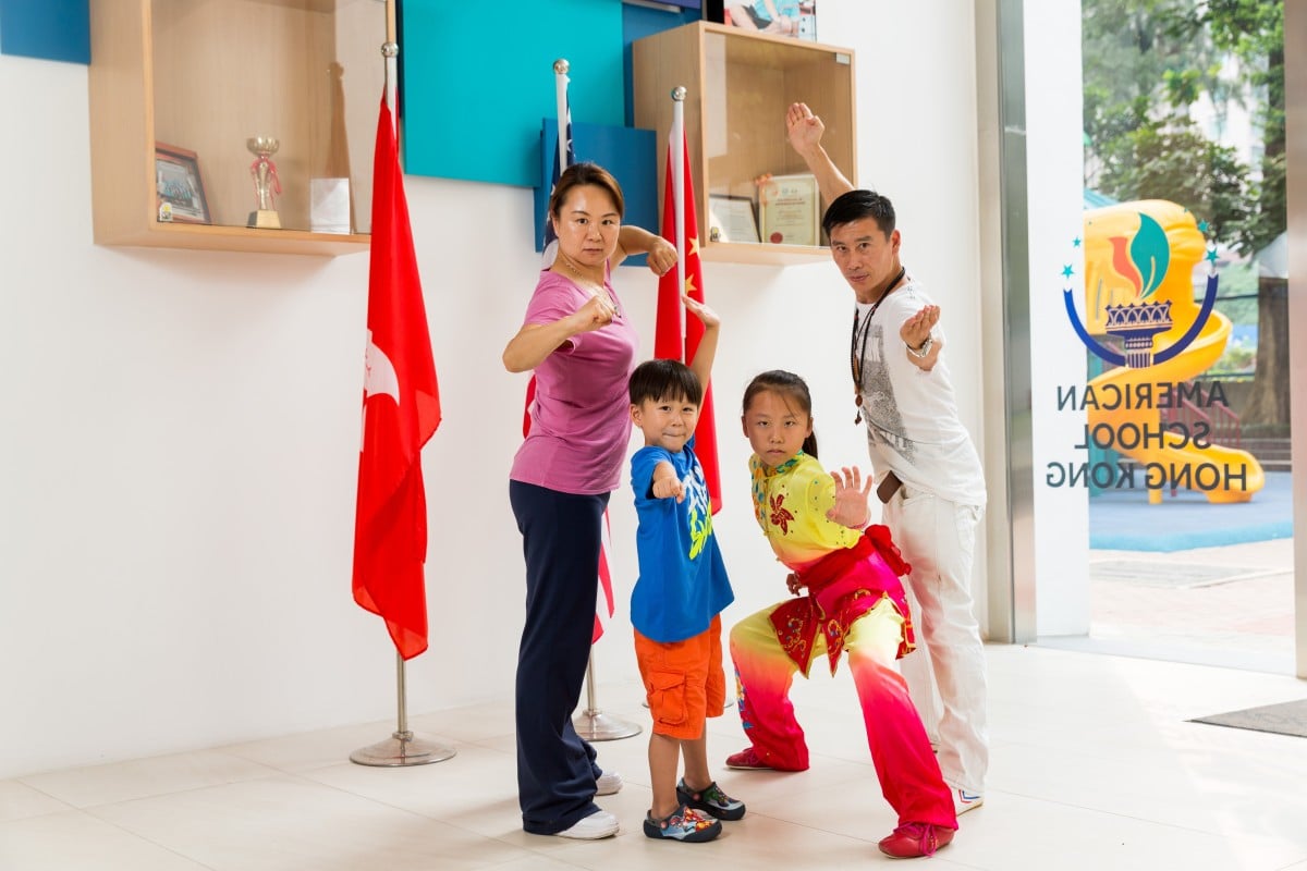 Two-time world champion Jada He (third from left) and her brother Dragon come from a family of champions.