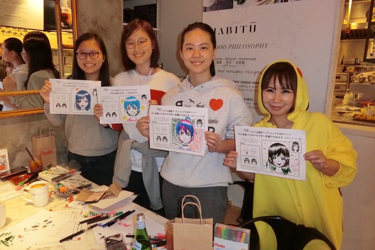 (From left) Junior Reporters Sherrie Mak, Jisoo Myung, Charlotte Fong, and cartoonist Britney Hamada.