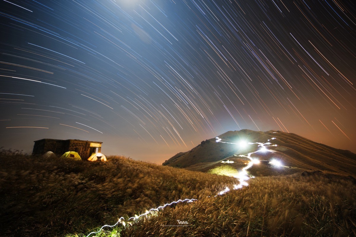 This photo by Timmy Wong is an example of the star trail technique.
