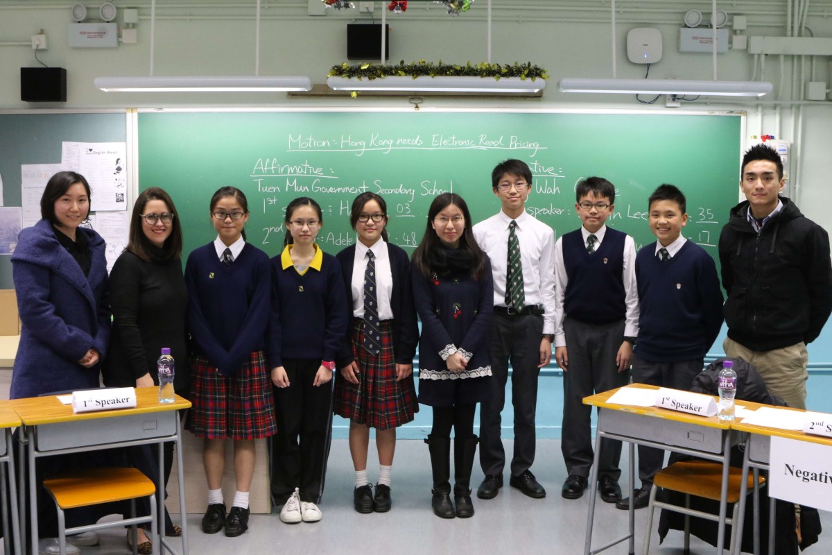 The debaters and their coaches. (Fom left)