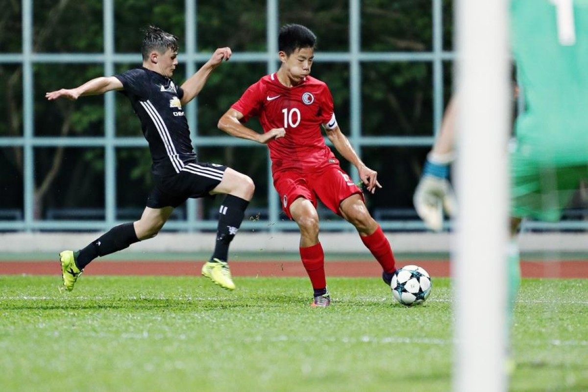 HKFA's star striker Sun Ming-him (right).