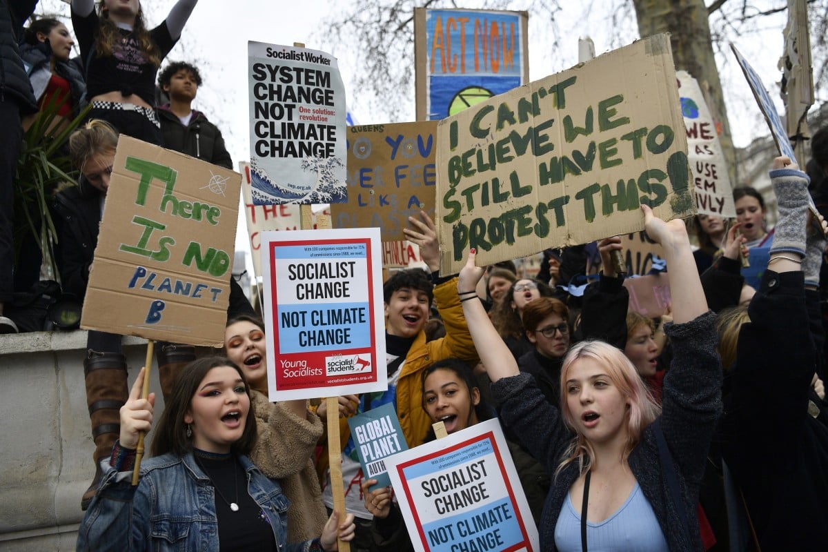 Students take part in a climate protest in London last Friday. If children don’t join the climate strike, their schools are underachieving, an environmental activist says.