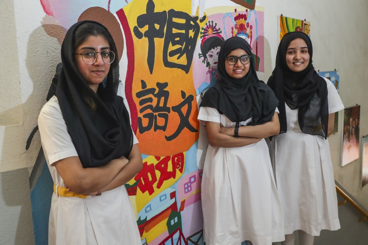 Bisma Naz, pictured (left to right) with Rani Maryam and Alina, feels she and others in a similar position could receive more help with learning the Chinese language.