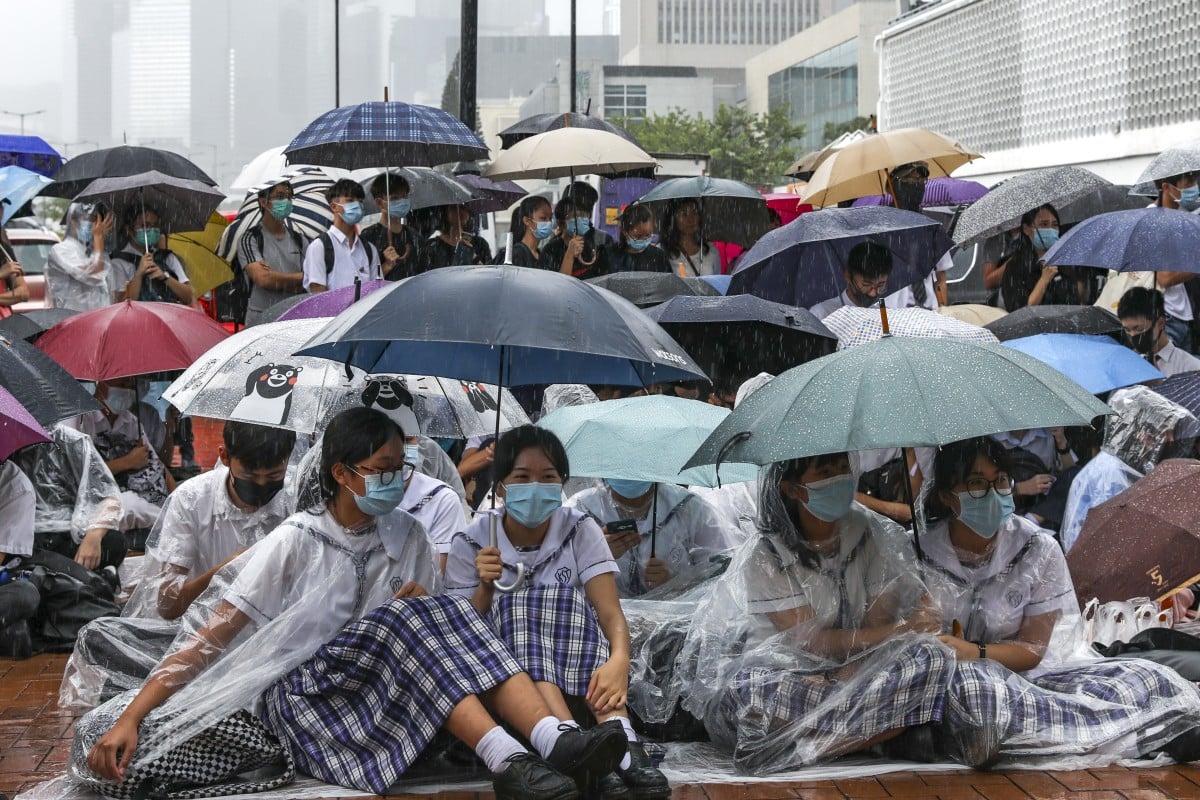 The rally – organised by groups such as Demosisto, Demovanile and Anti-Foo – was postponed by 90 minutes to noon because of bad weather.