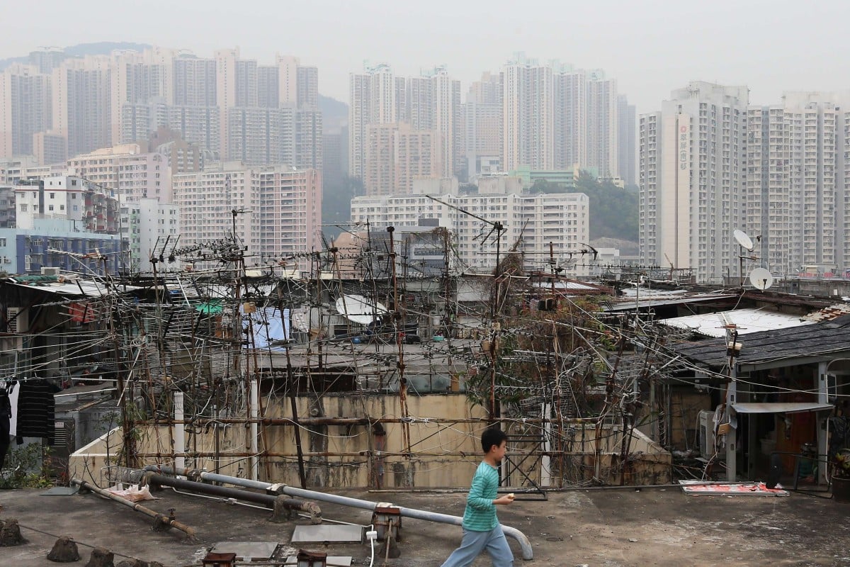Poverty forces people to live in illegal shacks on rooftop, like this one in Kwun Tong.