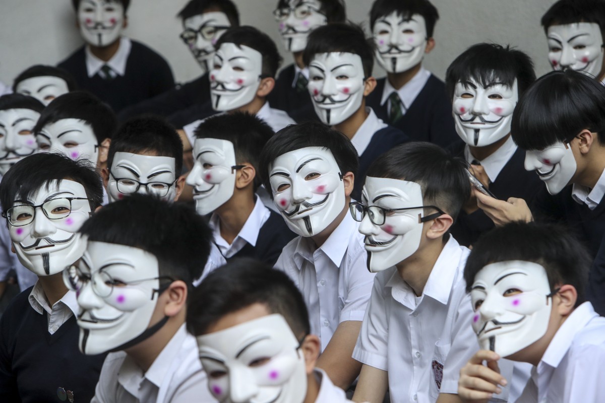 Students hold a sit-in at Ying Wa College, one of several student protests held across the city on Tuesday.