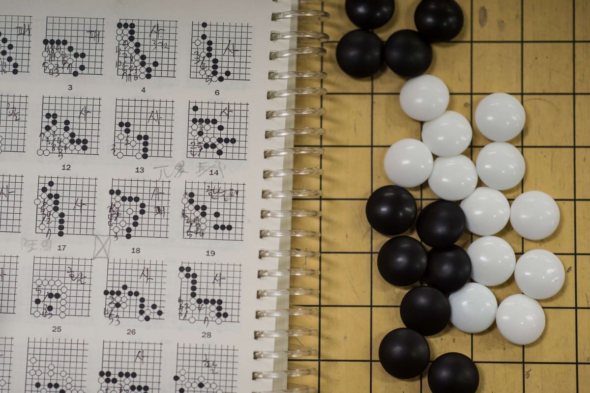 Strategic diagrams and stone pieces are displayed on a 'Go' board at the Lee Se-Dol School for 'Go' in Seoul. Photo: AFP