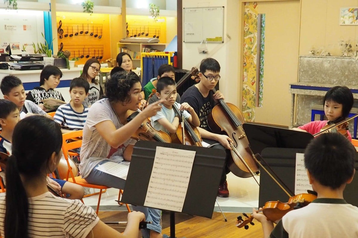 Violin superstar Iskandar Widjaja leasd a workshop for underprivileged young musicians.