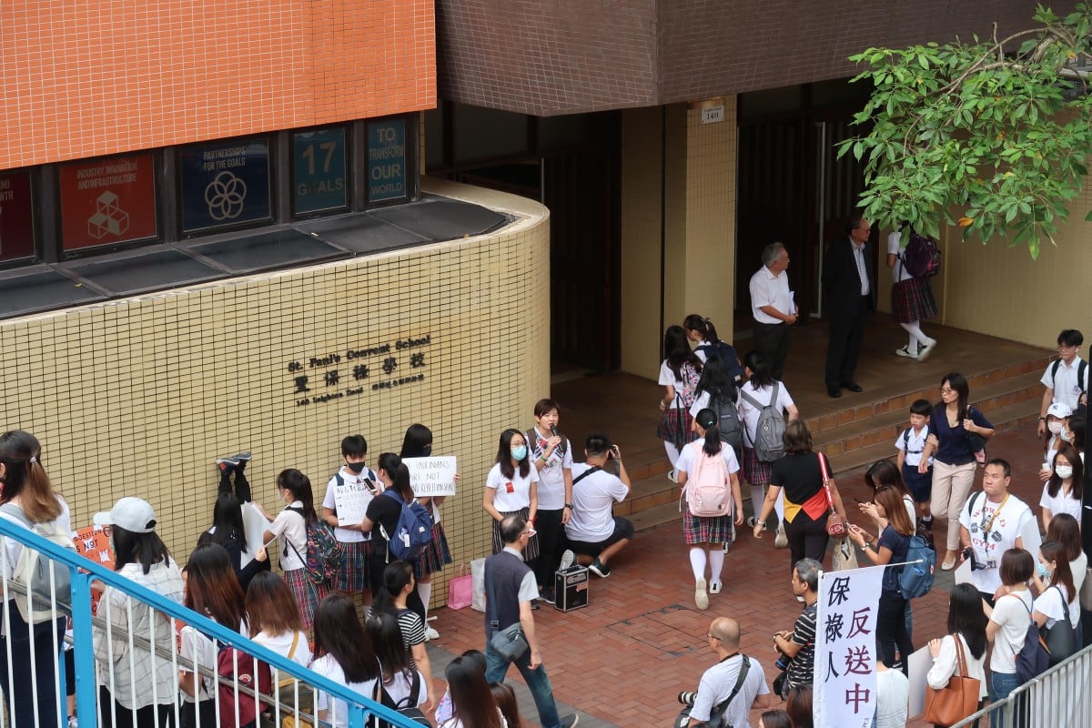 Students and alumni formed a human chain outside St Paul's Convent School on Friday morning.