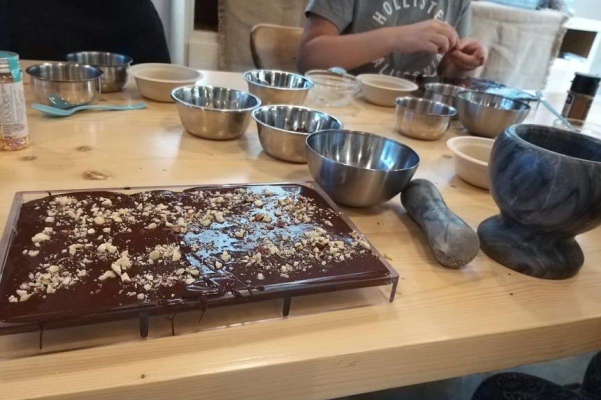 YP’s Junior reporters have a go at customising their own slabs of chocolate with a variety of toppings.