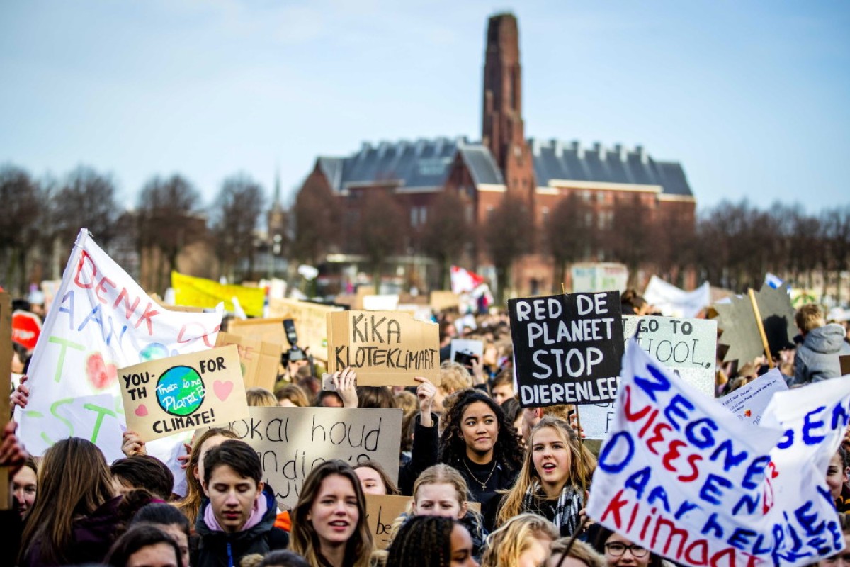 Dutch students march in a rally to claim for urgent measures to combat climate change, during a demonstration in The Hague.