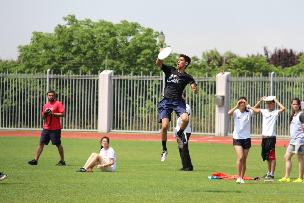 CIS player Tynan Eurwongpravit goes up for a long pass.