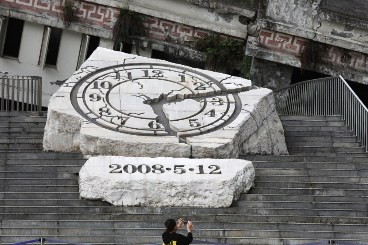 A memorial built for the 2008 Sichuan Earthquake. The cracks on the clock face indicate the time of the quake.