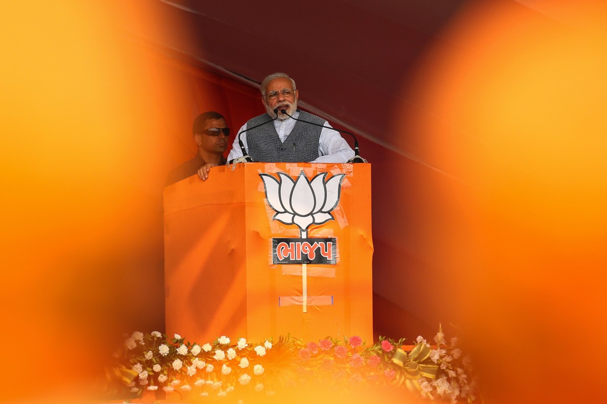 Indian Prime Minister Narendra Modi (C) is past the halfway point of his term.