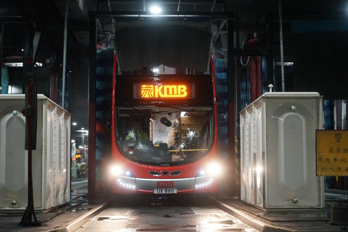 Buses go through a gigantic car wash after being fuelled.