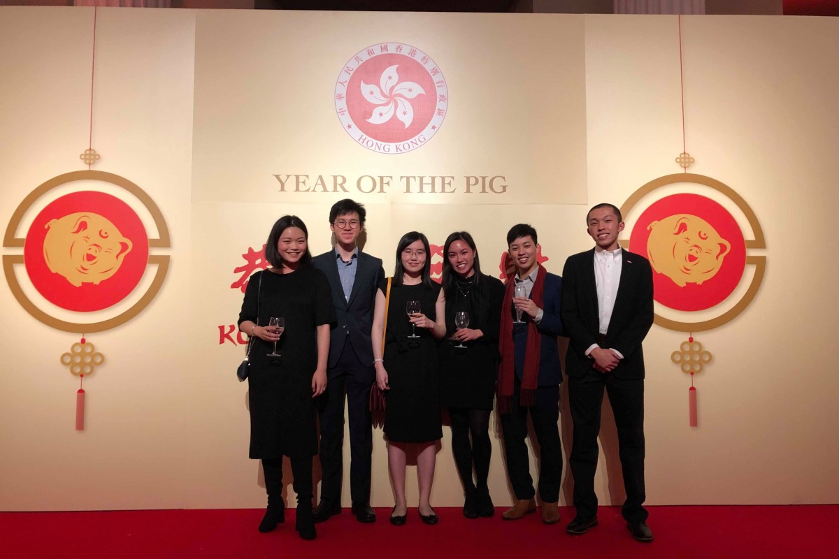 Henry Lui (far right) joins other Hong Kong students at the government’s Lunar New Year event in London.