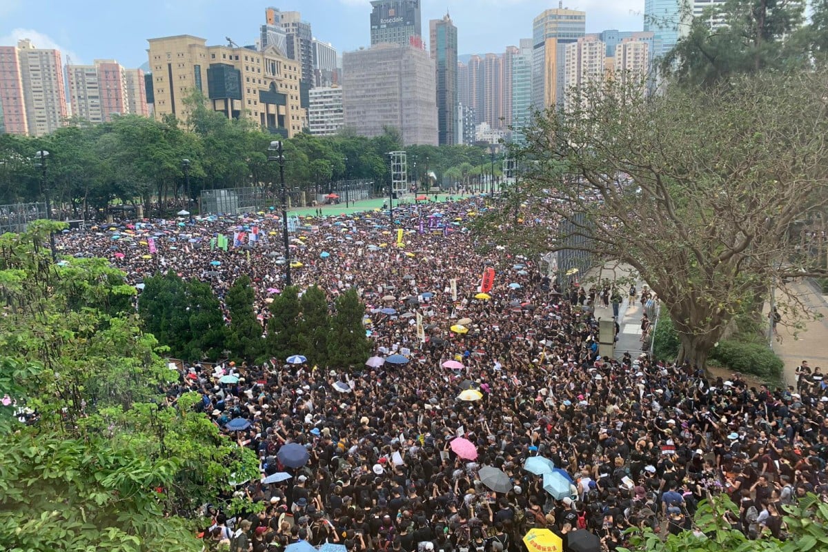 Protesters begin to fill up Victoria Park at 2.42pm for Sunday's march.