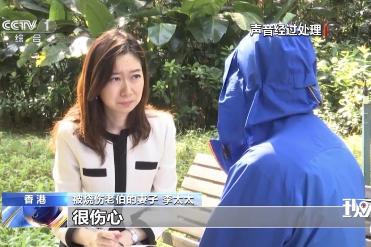 The wife of the middle-aged man who was set on fire by protesters last week has given an emotional interview to Chinese state television.