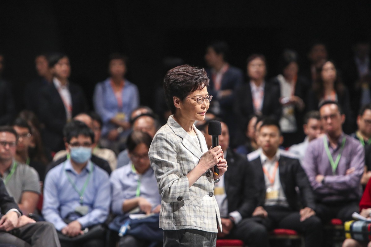 Hong Kong Chief Executive Carrie Lam meets the public during a community dialogue at Queen Elizabeth Stadium in Wan Chai.