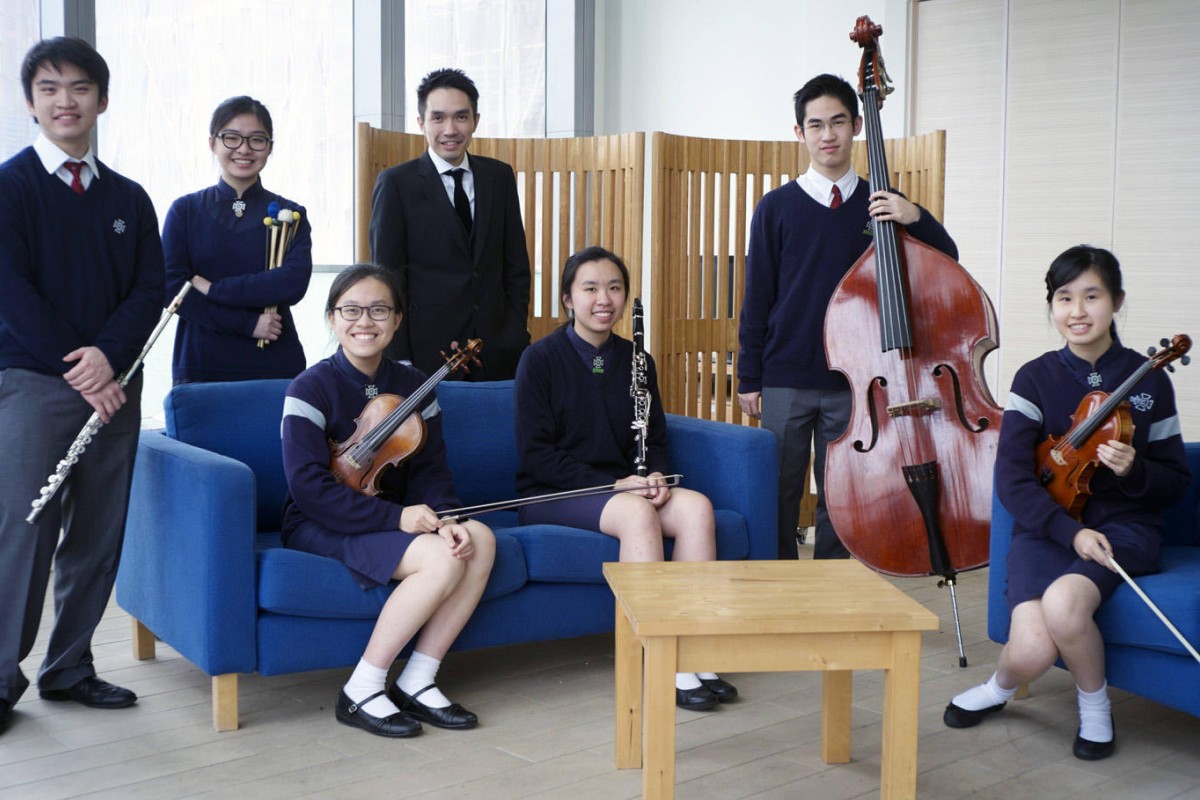 Warren Lee presents music career options, including teaching. Here he is (third from left) with some of his students: (standing, left to right) Jonathan Ma, Lauren Yuen, Dominic Law; (seated) Alison Kwok, Claudia Ng, Helen Yu