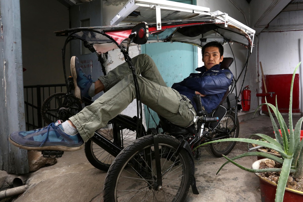 Gary Chan kicks back on his solar-powered recumbent bicycle.