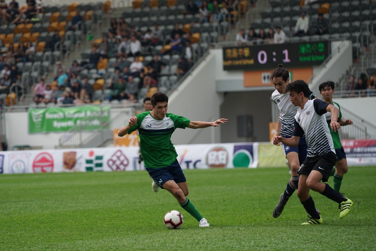South Island's Liam Doyle (left), who scored the equaliser in the second half, was awarded the MVP at the tournament.