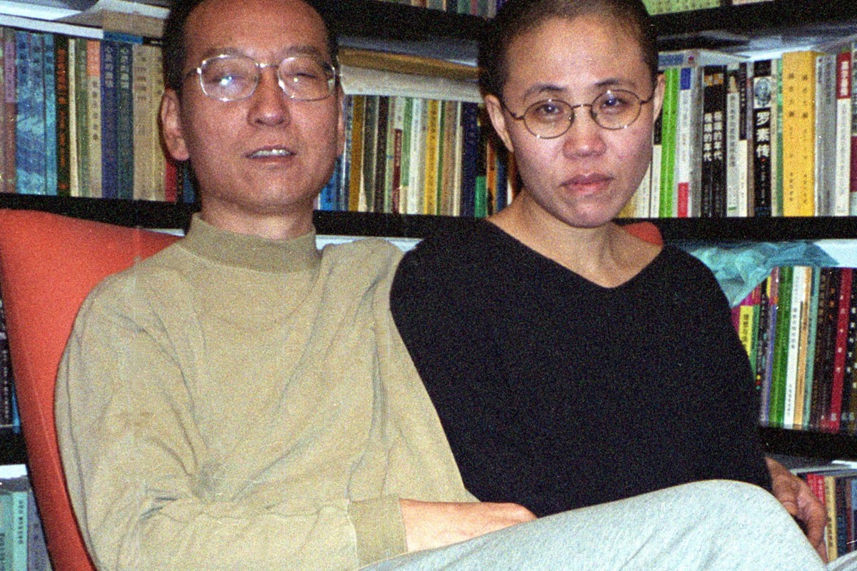 US urges China to release Liu Xiaobo (left) and allow Liu Xia out of house arrest.