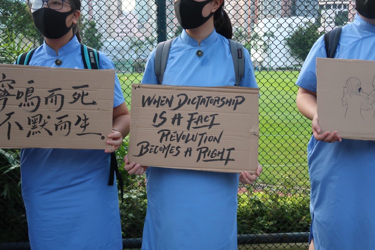 Students from across Hong Kong, including from True Light Secondary School in Tai Hang, held hands and formed a human chain in solidarity with the protesters on Thursday morning.