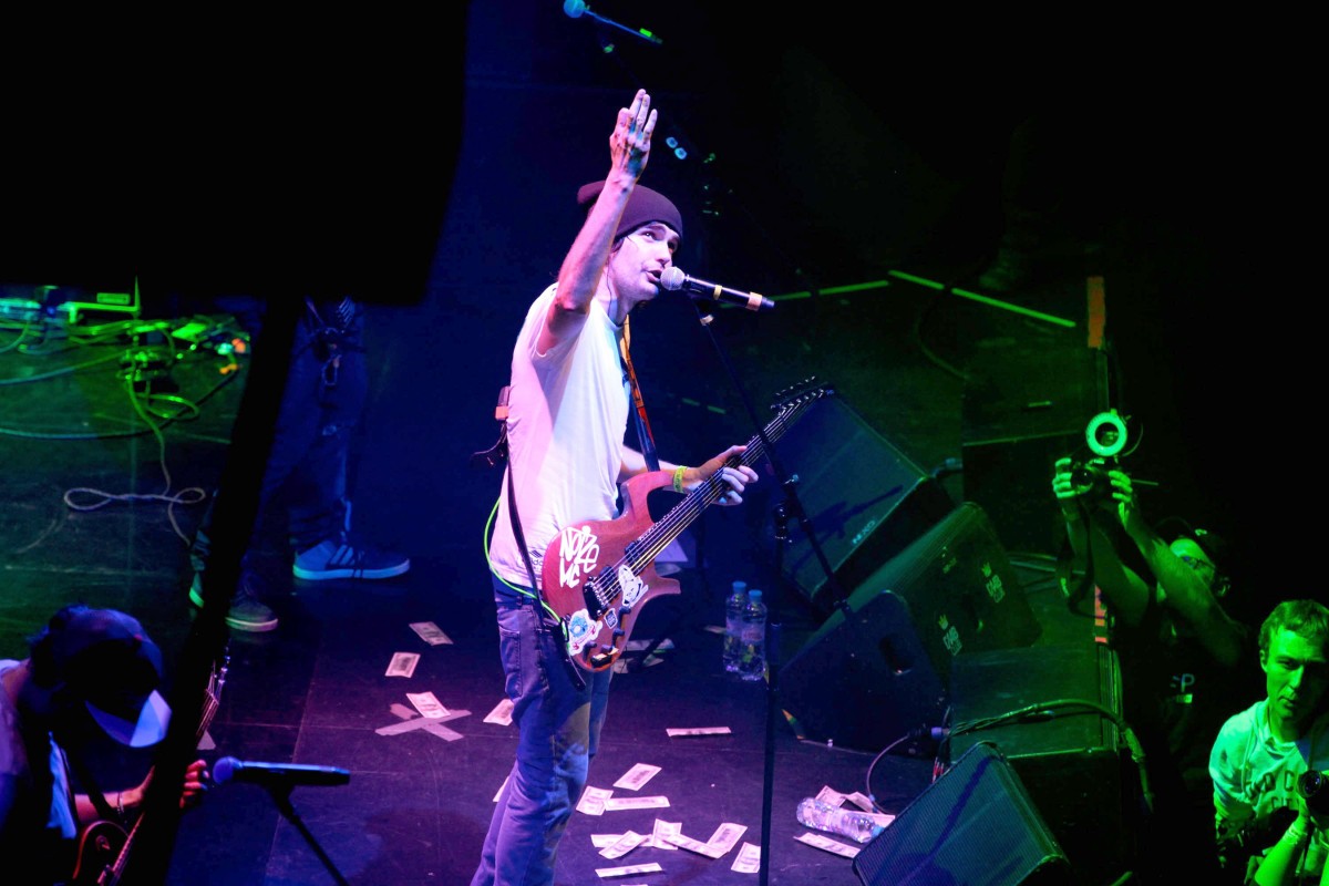 Russian hip-hop star Ivan Alekseev, better known as Noize MC, performs at the GlavClub in Moscow, November 15.